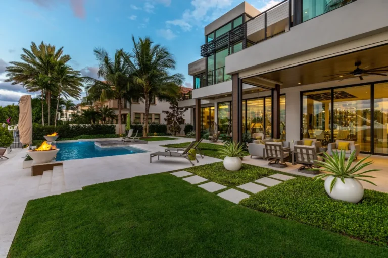 Custom residential swimming pool and patio designed for a modern South Florida home