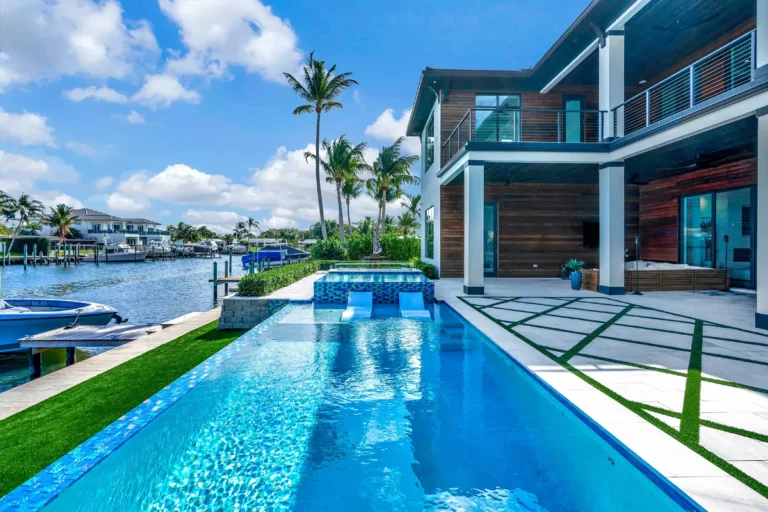 Finished waterfront custom pool built by TotalScape Design in South Florida